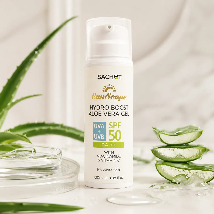 Woman holding a bottle of Sachet Cooling SPF 50 Aloe Gel with a background of aloe vera plants.