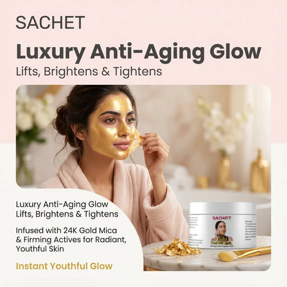 Woman applying gold facial mask with Sachet Luxury Anti-Aging Glow product on a marble surface.
