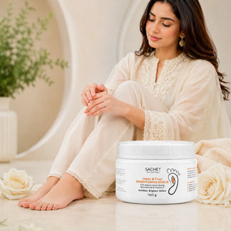 SACHET Hand & Foot Brightening Scrub jar with a blurred woman in the background