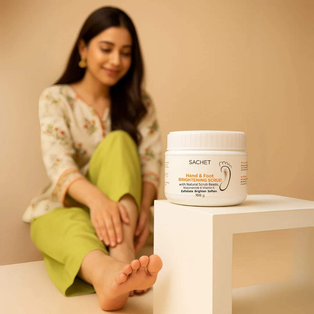 Woman sitting next to a jar of 'SACHET' foot scrub on a beige background