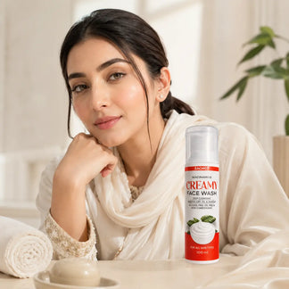 Woman holding a bottle of Sachet Niacinamide Face Wash with product details on a blurred background