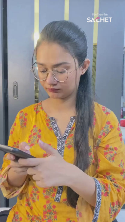 Pakistani woman applying Glow Boost Moisturizer Sunscreen SPF 65